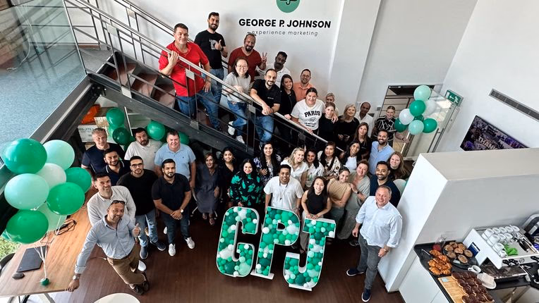 What is George P. Johnson's experience in marketing?